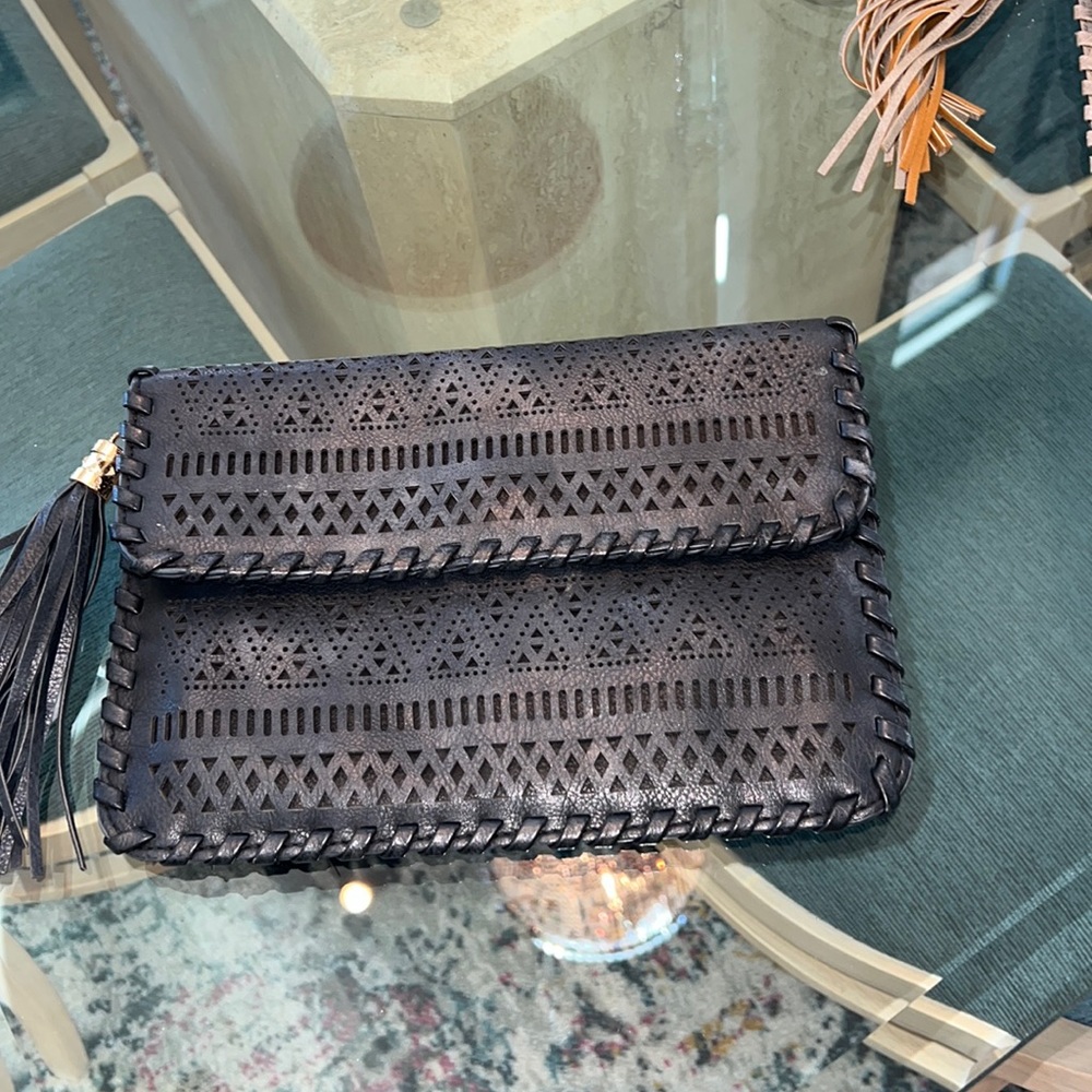 Black color clutch, no return